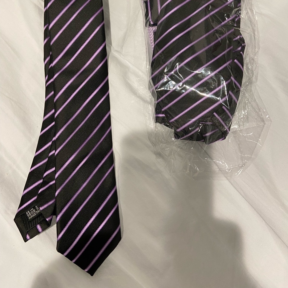 Father and son matching ties.